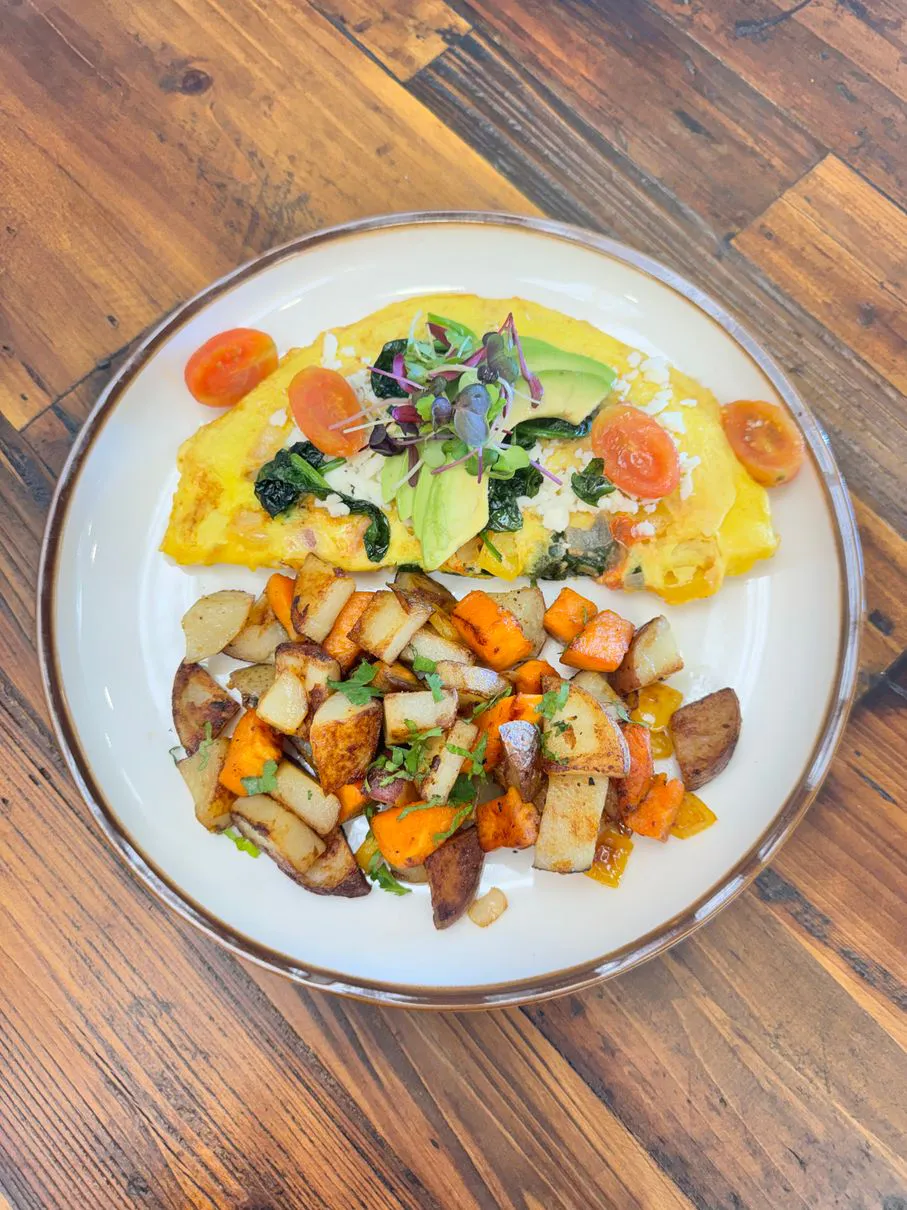 Veggie omelet with roasted potatoes at Simply Sabroso by Taqueria Rendon, a Café & Dessert Shop in Northfield