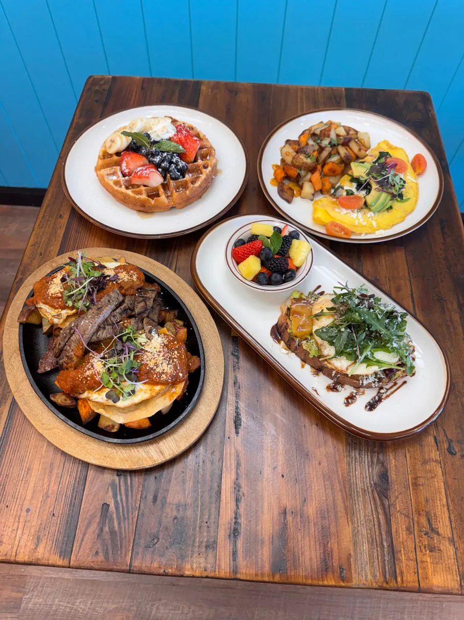 Assorted brunch platter with waffle and steak at Simply Sabroso by Taqueria Rendon, a Café & Dessert Shop in Northfield